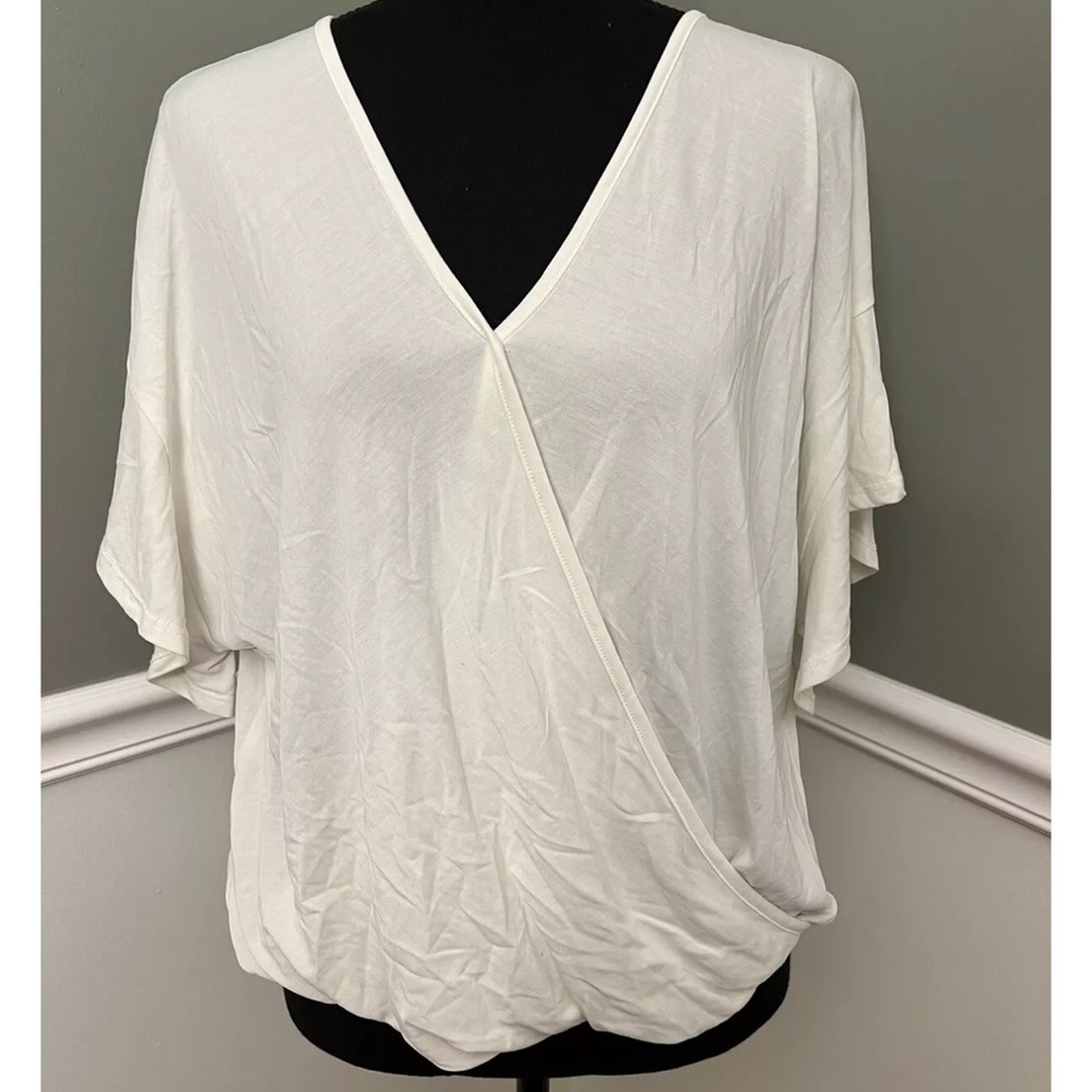Alya White T-shirt with A Cutout/ Slit In Front